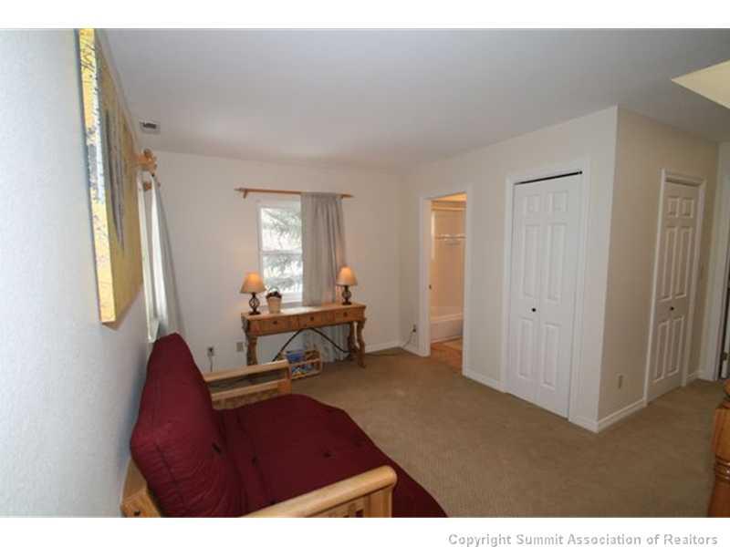 487 Main Street, Unit A Frisco, CO 80443 - Photo 14 of 22 a living room with furniture and a window