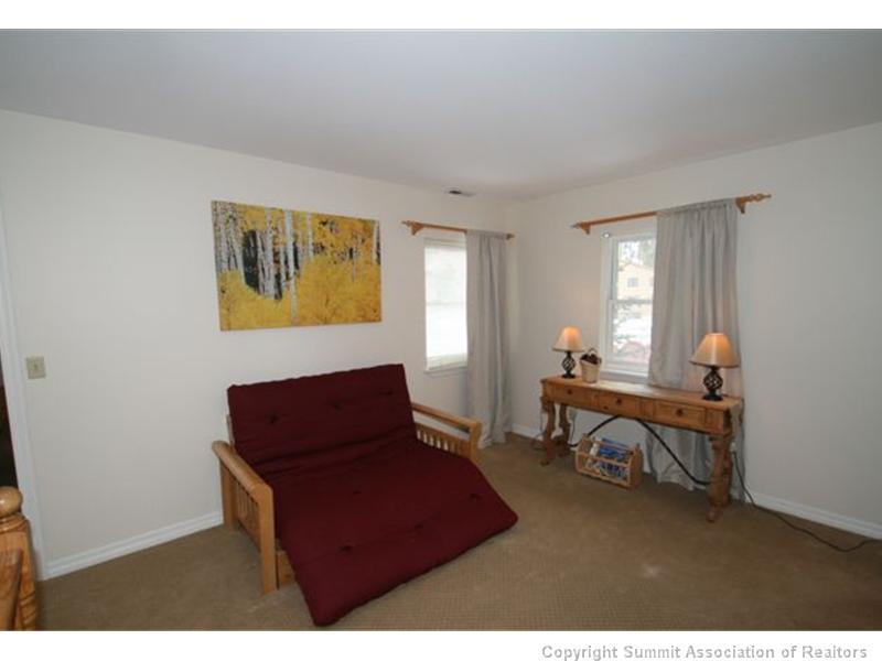 487 Main Street, Unit A Frisco, CO 80443 - Photo 15 of 22 a living room with furniture and a window