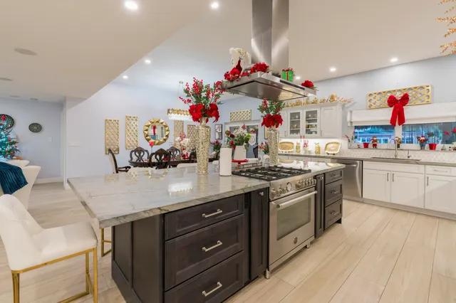 a bathroom with a sink vanity granite and a mirror