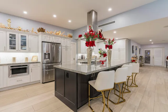 a view of a chairs and table in the patio