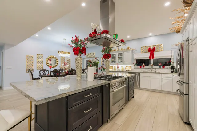a outdoor living space with patio furniture and wooden floor