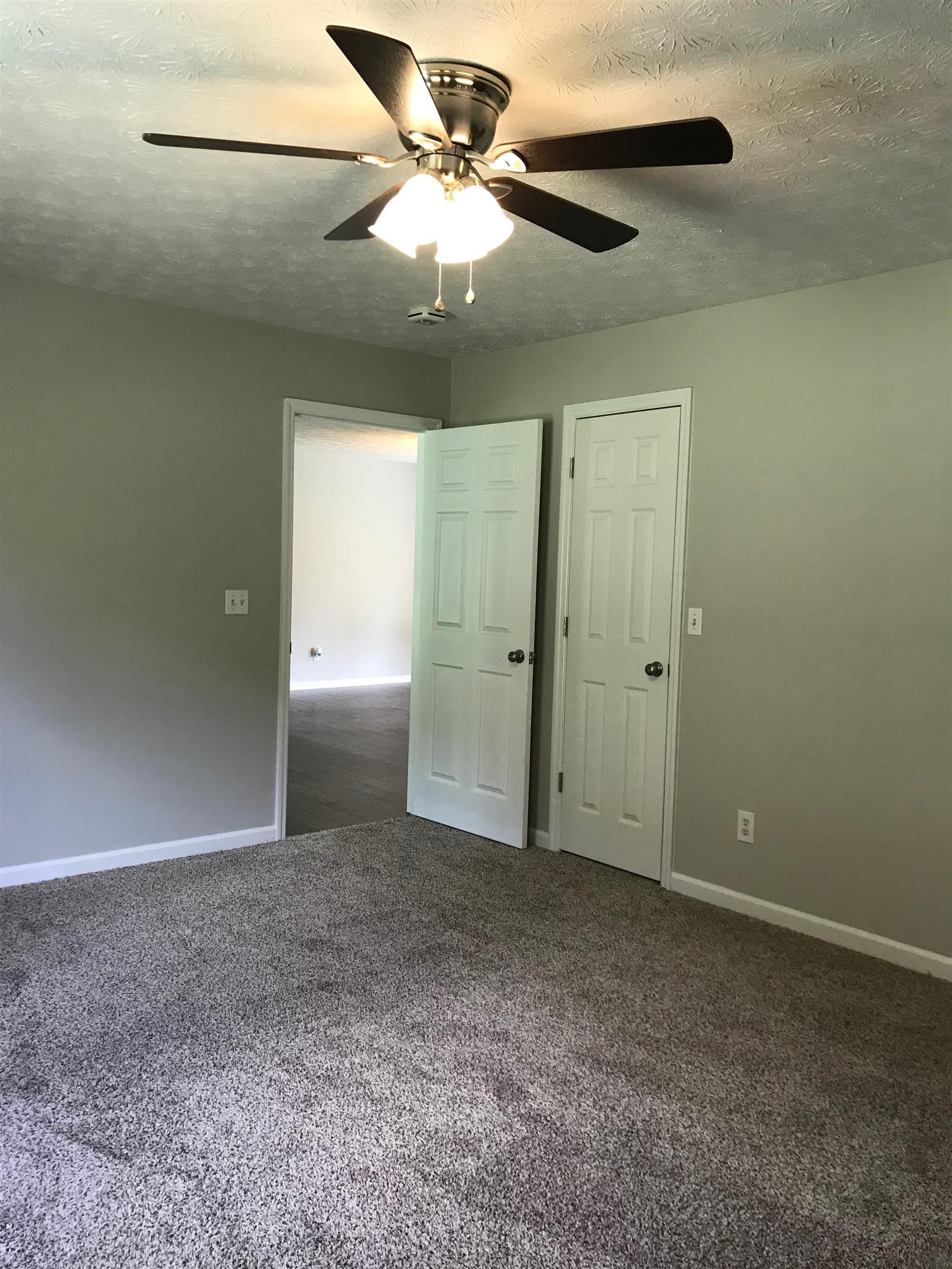 604 Tidwell Road Bon Aqua, TN 37025 - Photo 10 of 20 Another view of the master with walk in closet