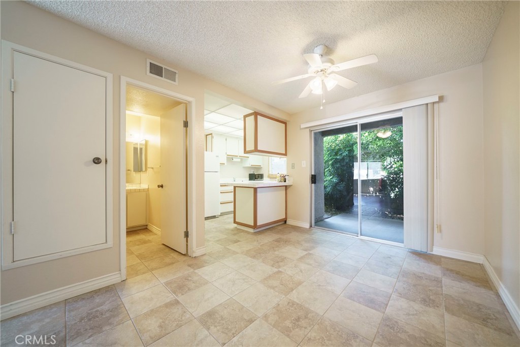 2255 Cahuilla Street, Unit 32 Colton, CA 92324 - Photo 12 of 35 a view of a kitchen with a sink and a window