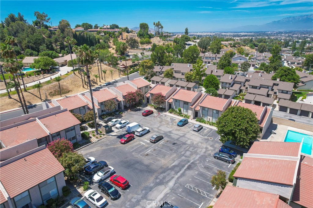 2255 Cahuilla Street, Unit 32 Colton, CA 92324 - Photo 29 of 35 an aerial view of residential houses with outdoor space