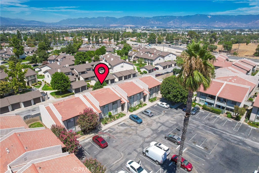 2255 Cahuilla Street, Unit 32 Colton, CA 92324 - Photo 30 of 35 an aerial view of residential houses with outdoor space