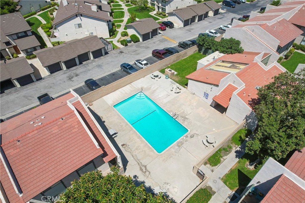 2255 Cahuilla Street, Unit 32 Colton, CA 92324 - Photo 31 of 35 an aerial view of a house with a yard