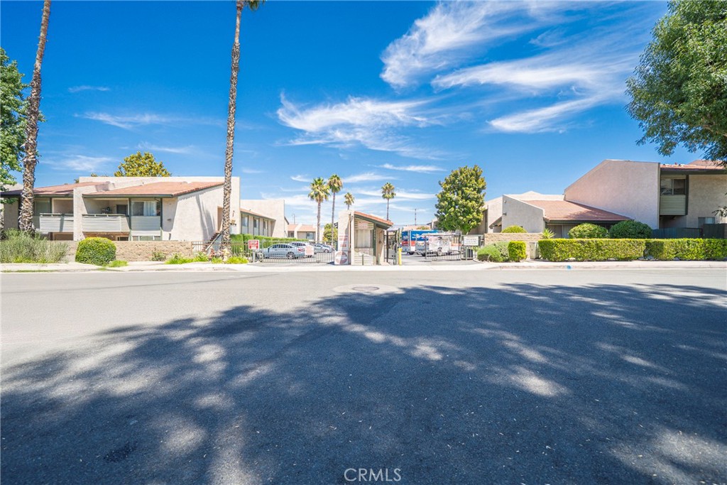 2255 Cahuilla Street, Unit 32 Colton, CA 92324 - Photo 7 of 35 a view of street with houses