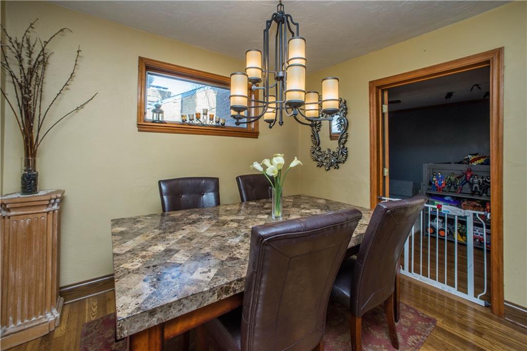 1030 Prospect Road Pittsburgh, PA 15227 - Photo 11 of 25 This view of the dining room shows a peak into the Master Bedroom/flexible space area.