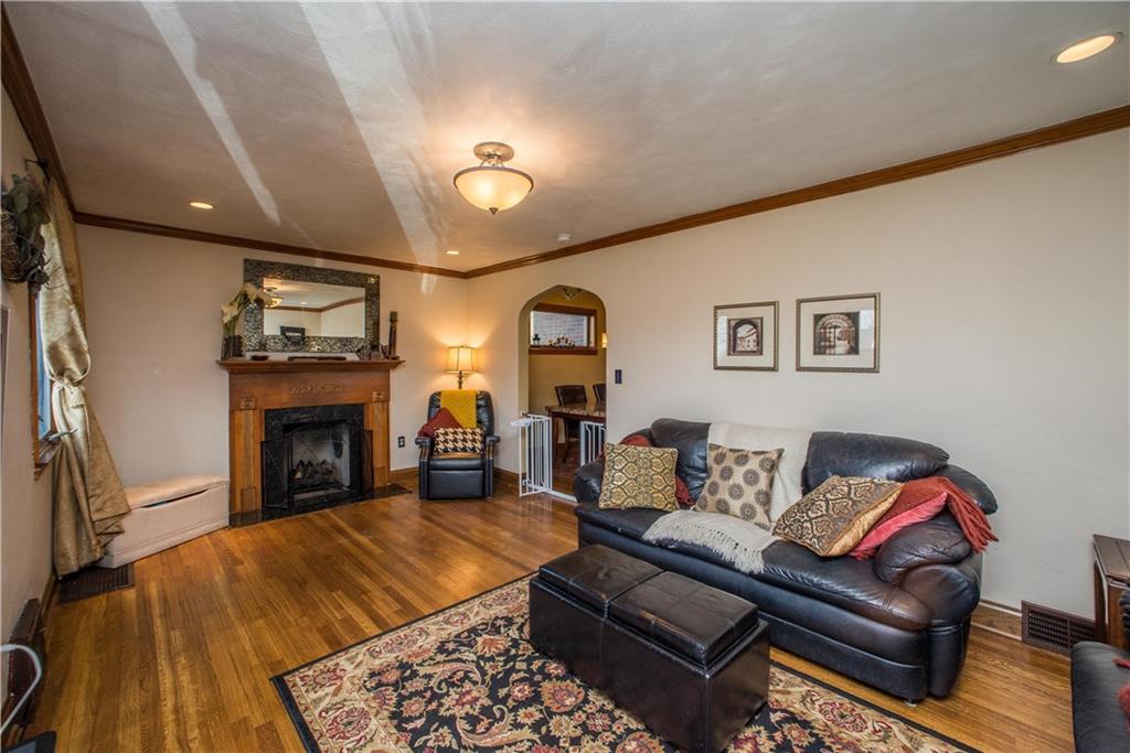 1030 Prospect Road Pittsburgh, PA 15227 - Photo 3 of 25 Check out the beautiful hardwood floors, fireplace, plaster walls and arched openings.