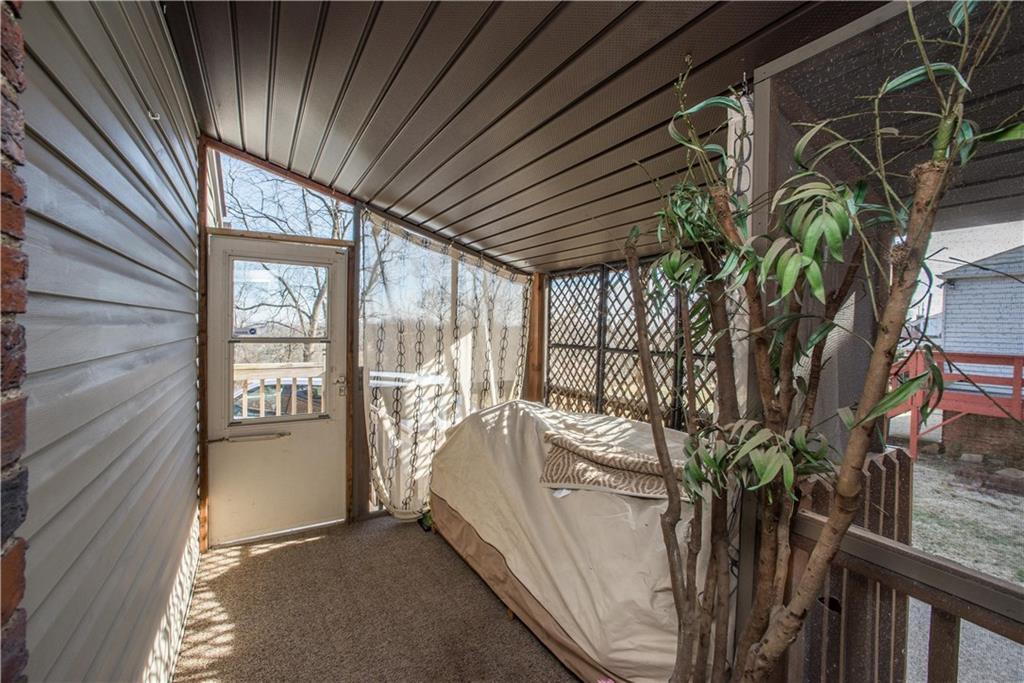1030 Prospect Road Pittsburgh, PA 15227 - Photo 23 of 25 So convenient to have a covered screened in porch area to access the kitchen.