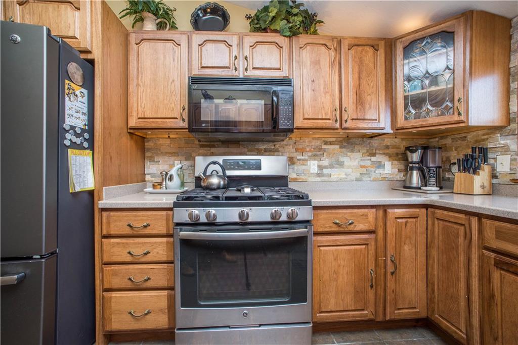 1030 Prospect Road Pittsburgh, PA 15227 - Photo 8 of 25 you will enjoy the new gas stove, and have you noticed the gorgeous stacked stone backsplash?
