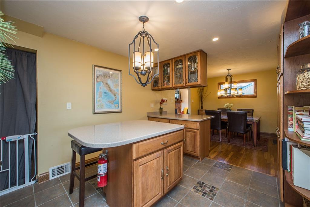 1030 Prospect Road Pittsburgh, PA 15227 - Photo 9 of 25 This kitchen offers a lot of options, including a center island for casual meals, and a peninsula island with more counter and storage space.