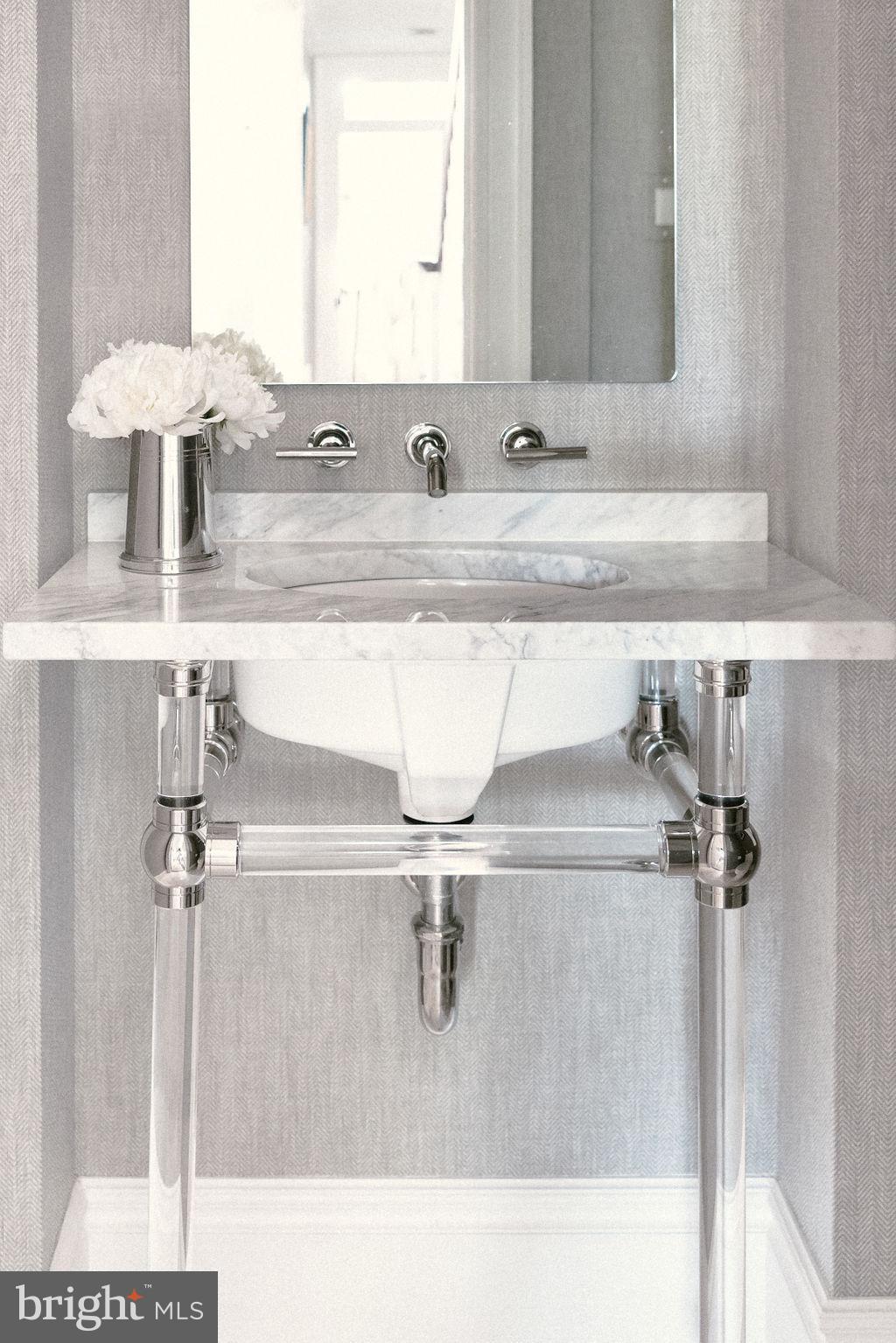 400 G Street Southeast Washington, DC 20003 - Photo 16 of 56 a bathroom with a sink and a mirror