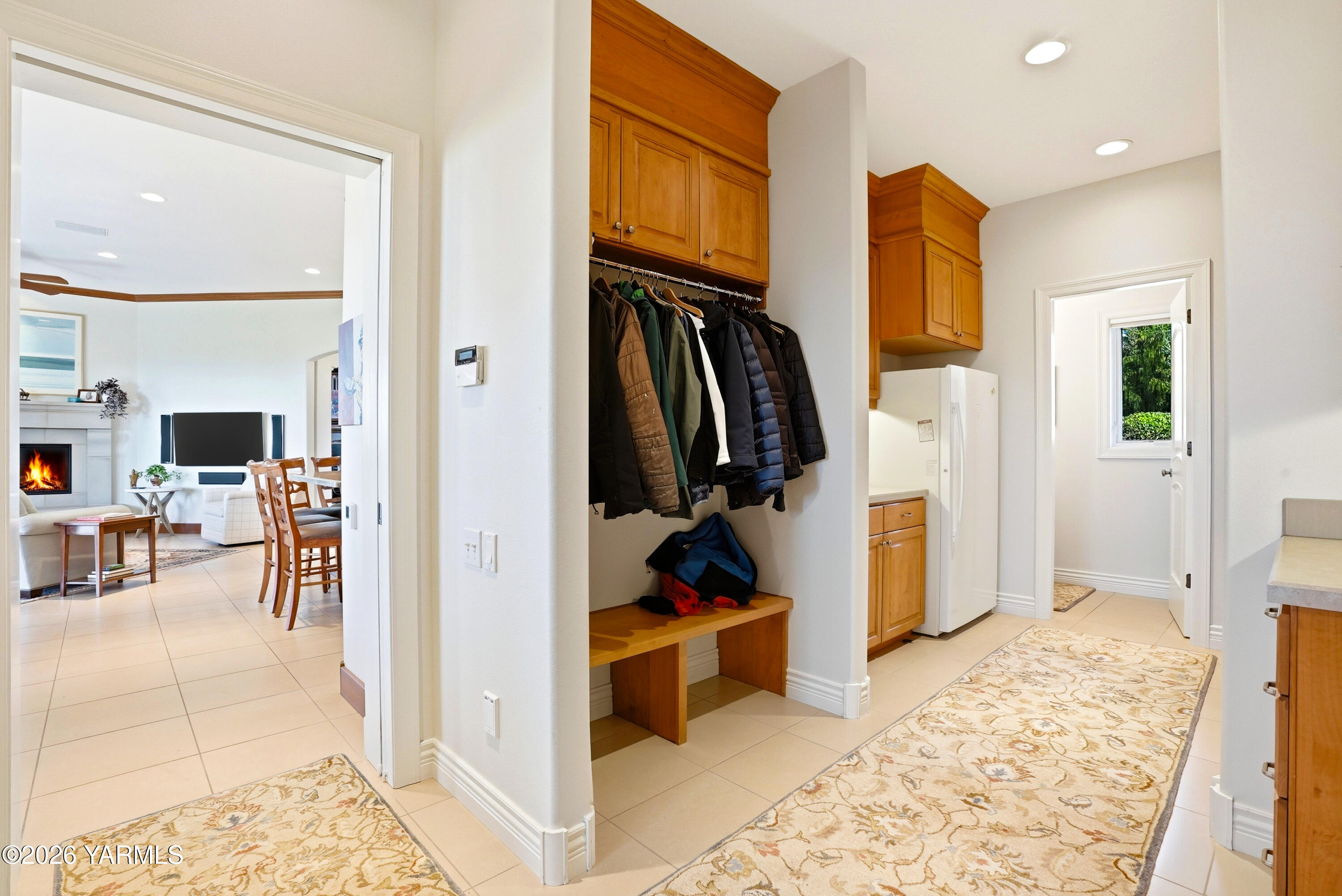 660 Noble Hill Road Yakima, WA 98908 - Photo 18 of 63 a view of walk in closet with living room and couch