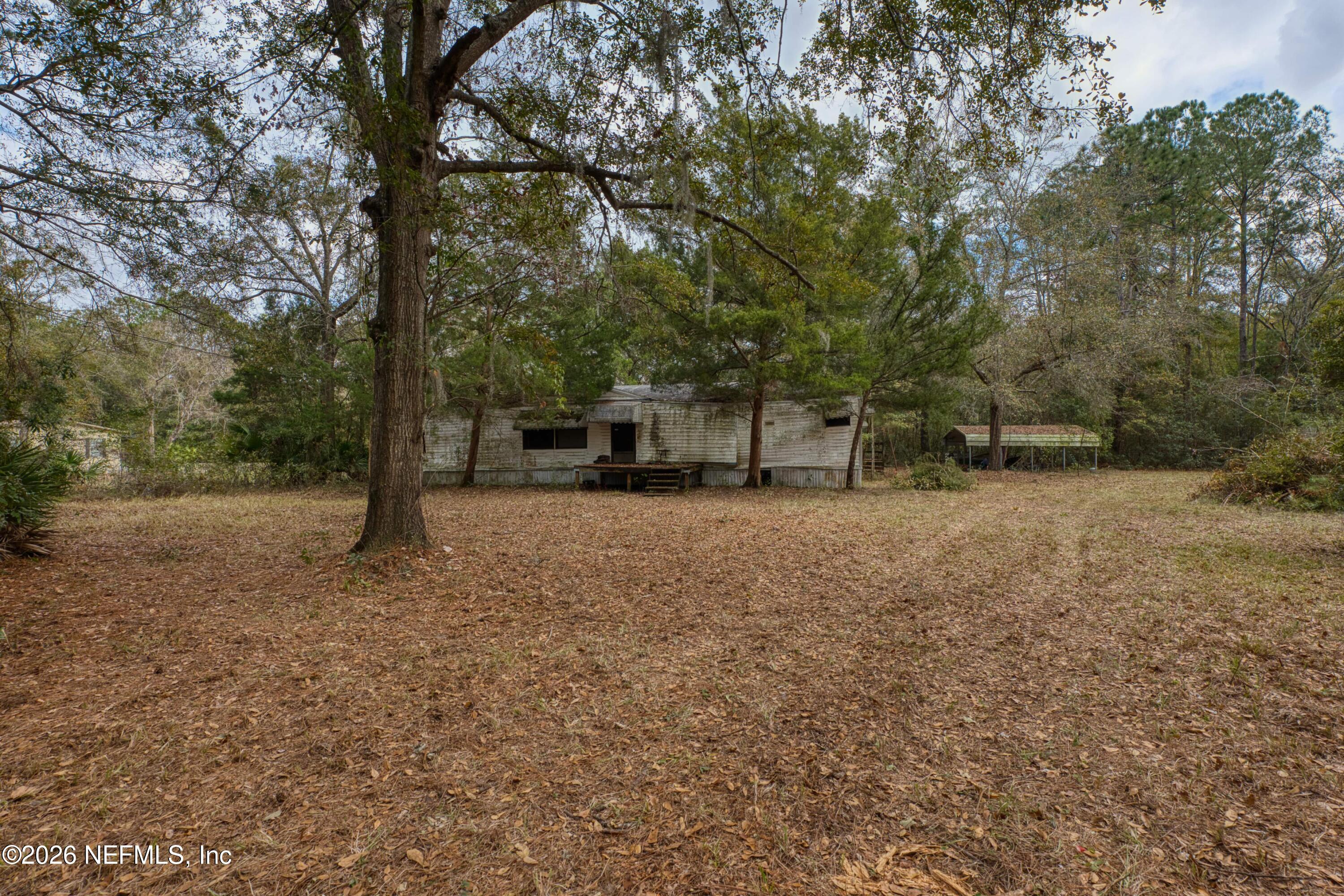 1049 Hammond Boulevard Jacksonville, FL 32221 - Photo 12 of 16 a view of a outdoor space with trees