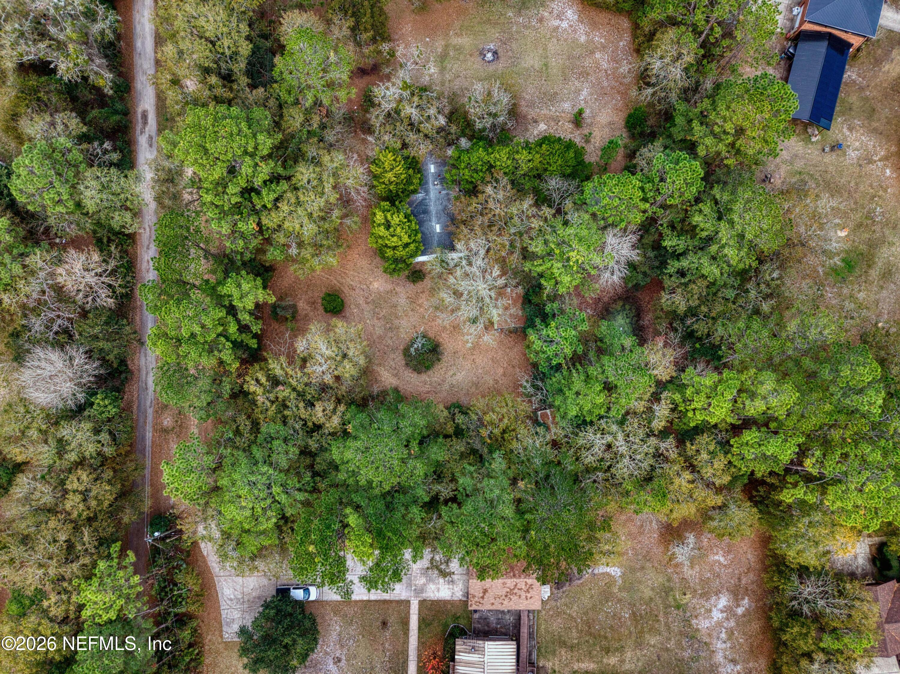 1049 Hammond Boulevard Jacksonville, FL 32221 - Photo 2 of 16 an aerial view of a house with a yard