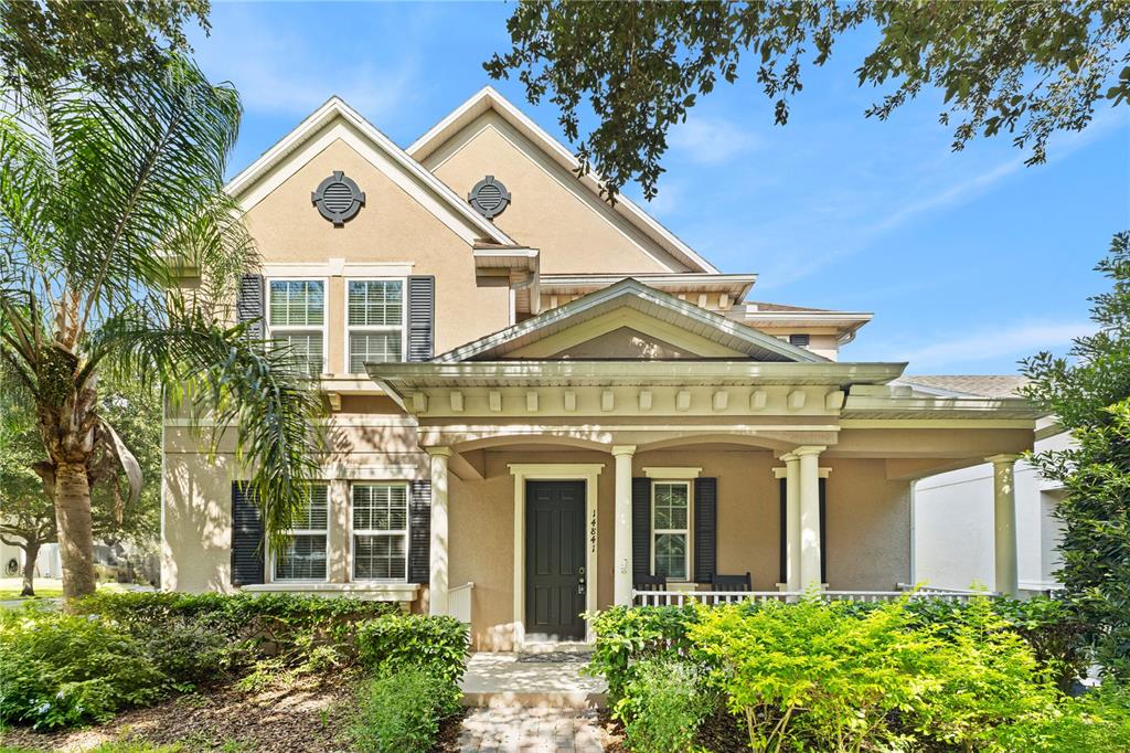 14841 Porter Road Winter Garden, FL 34787 - Photo 1 of 1 a front view of a residential houses with yard
