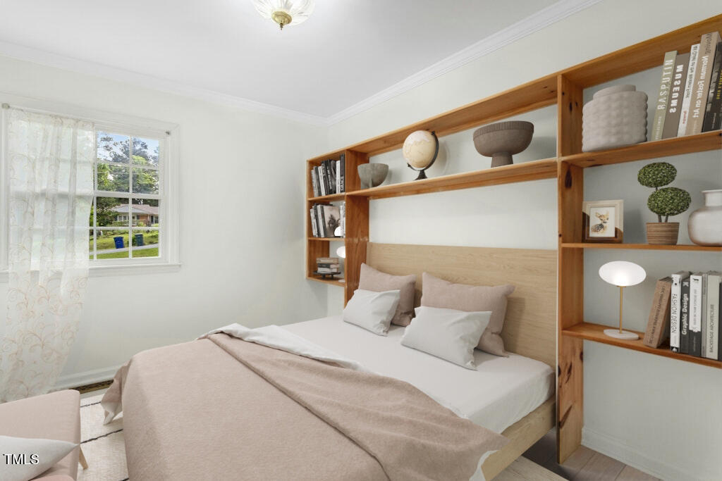4021 Chaucer Drive Durham, NC 27705 - Photo 25 of 36 a bedroom with a bed and with window