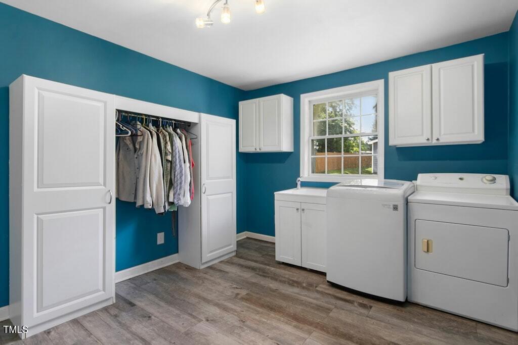 4021 Chaucer Drive Durham, NC 27705 - Photo 29 of 36 a view of utility room with washer and dryer