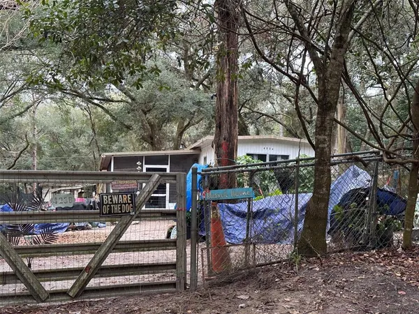 a view of a chairs and table in the outdoor