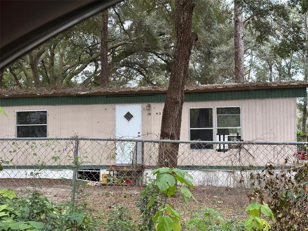 4375 East Archer Lane Inverness, FL 34452 - Photo 4 of 7 a view of a house with a yard