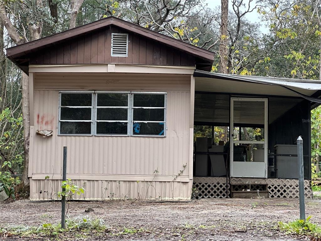 4375 East Archer Lane Inverness, FL 34452 - Photo 7 of 7 a front view of a house with a yard