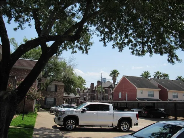 a car parked in front of a house