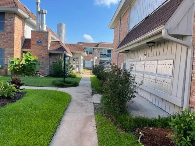 a view of house with outdoor space