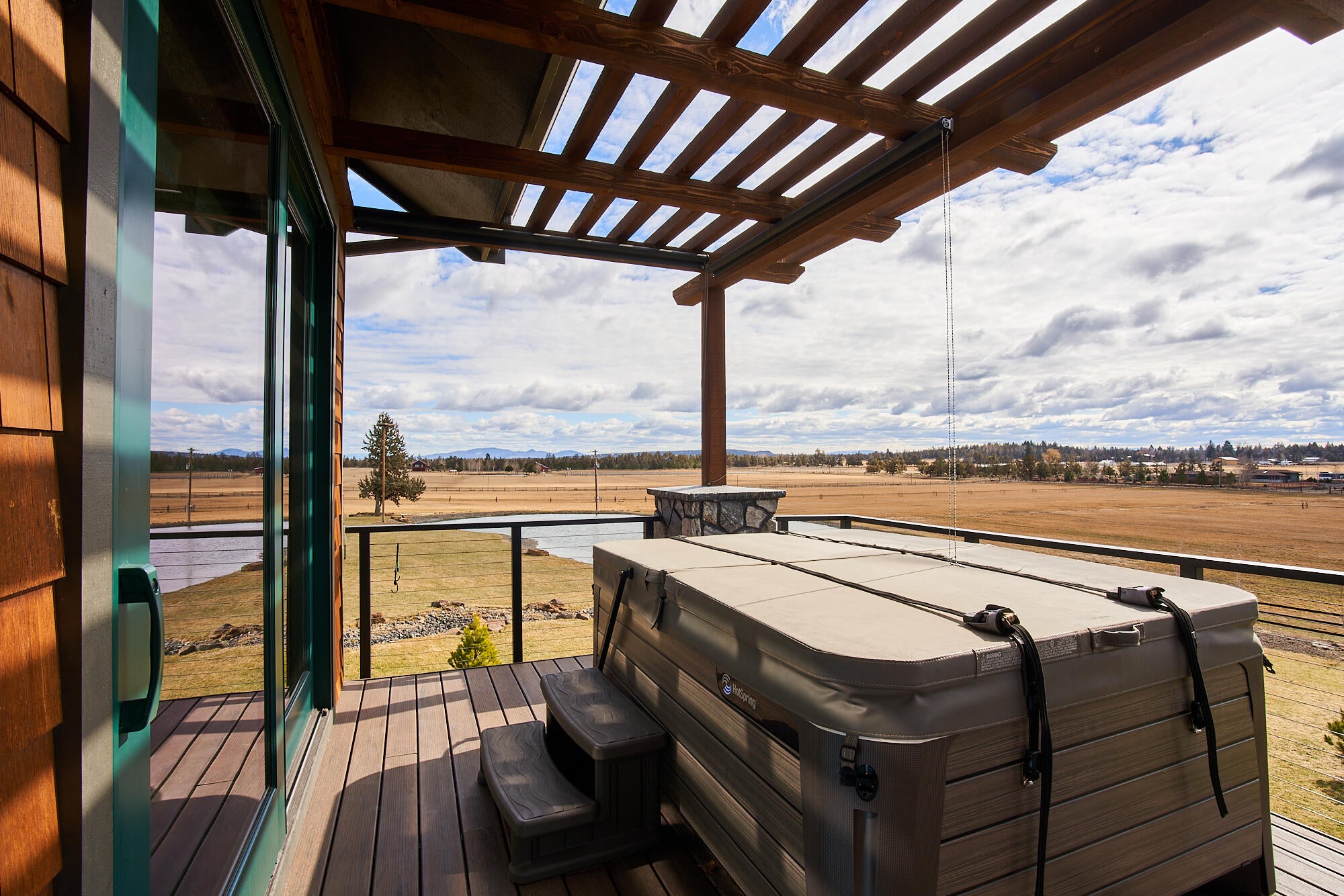 19525 Innes Market Road Bend, OR 97703 - Photo 20 of 56 The view from the hot tub/spa on the deck of the Main home. You can see mountains as well as the beautiful fields of the valley.