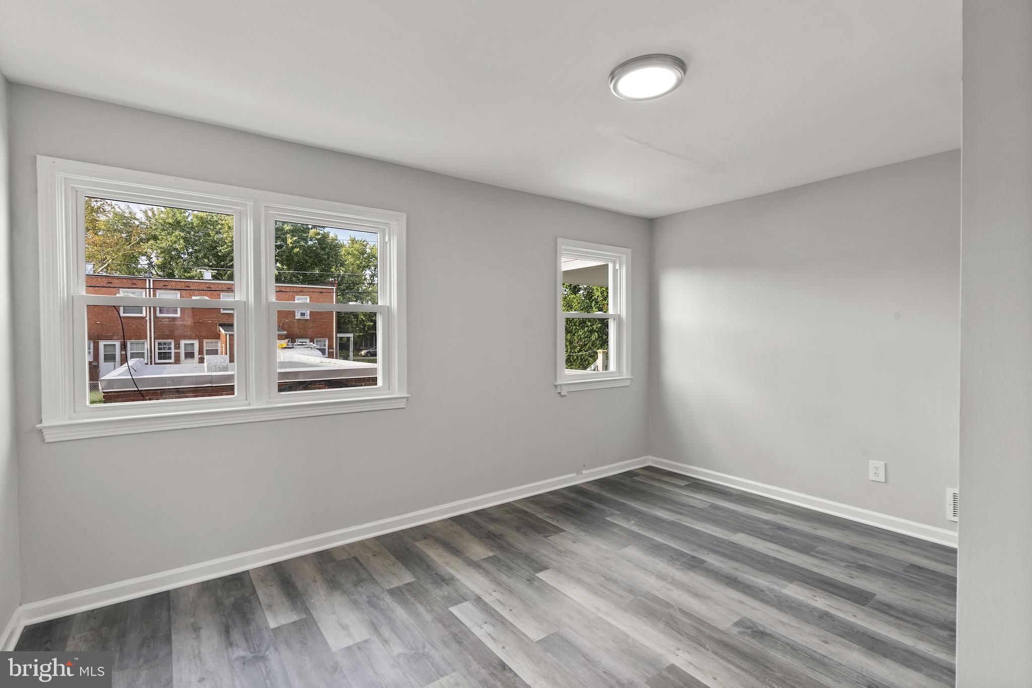 8059 Gray Haven Road Dundalk, MD 21222 - Photo 11 of 22 an empty room with a window