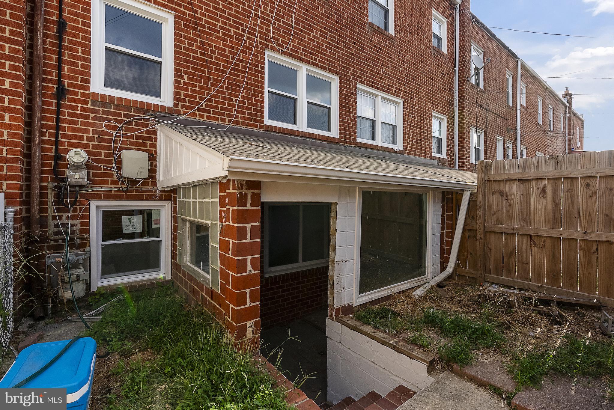 8059 Gray Haven Road Dundalk, MD 21222 - Photo 20 of 22 a front view of a house with a garage