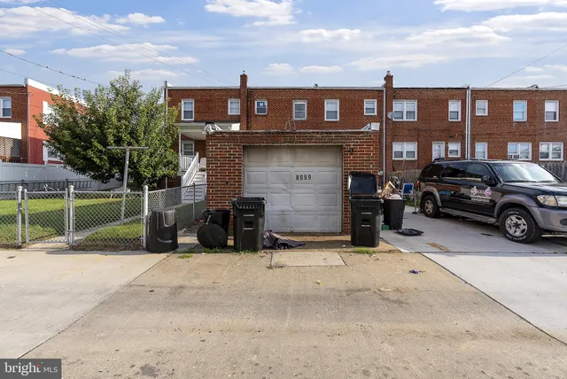 a car parked in front of a building