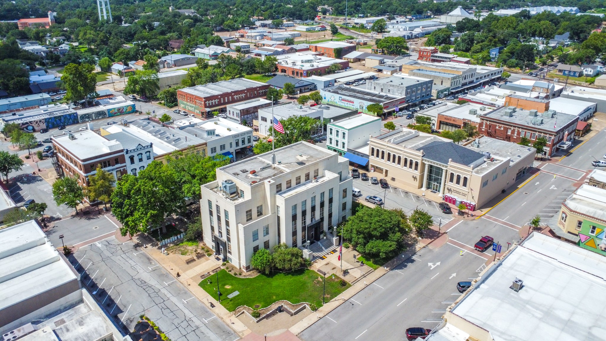 325 East Main Street Brenham, TX 77833 - Photo 8 of 9 a view of a city with tall buildings