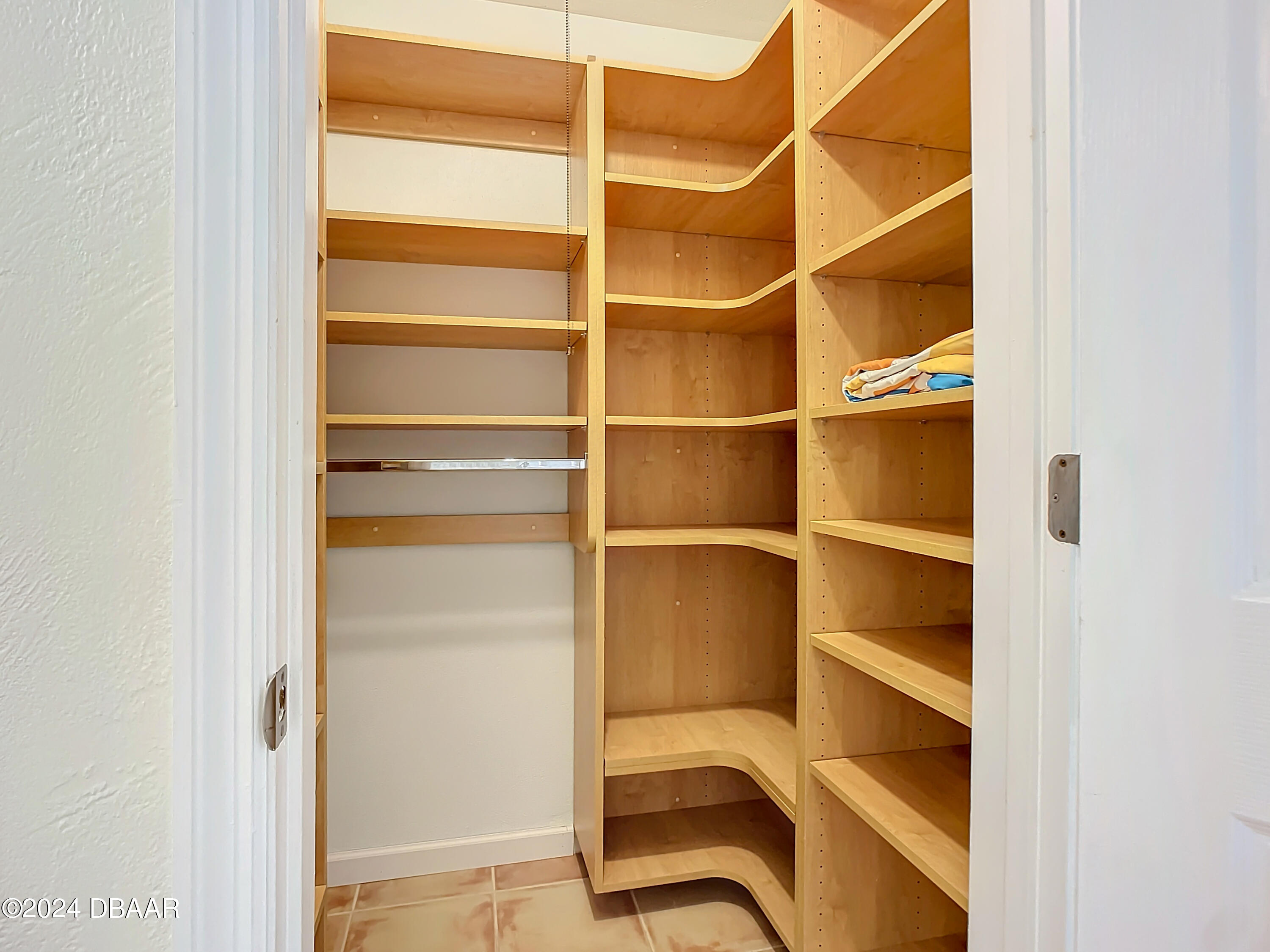 55 Merrywood Circle Ormond Beach, FL 32174 - Photo 24 of 64 a view of a room with shelves