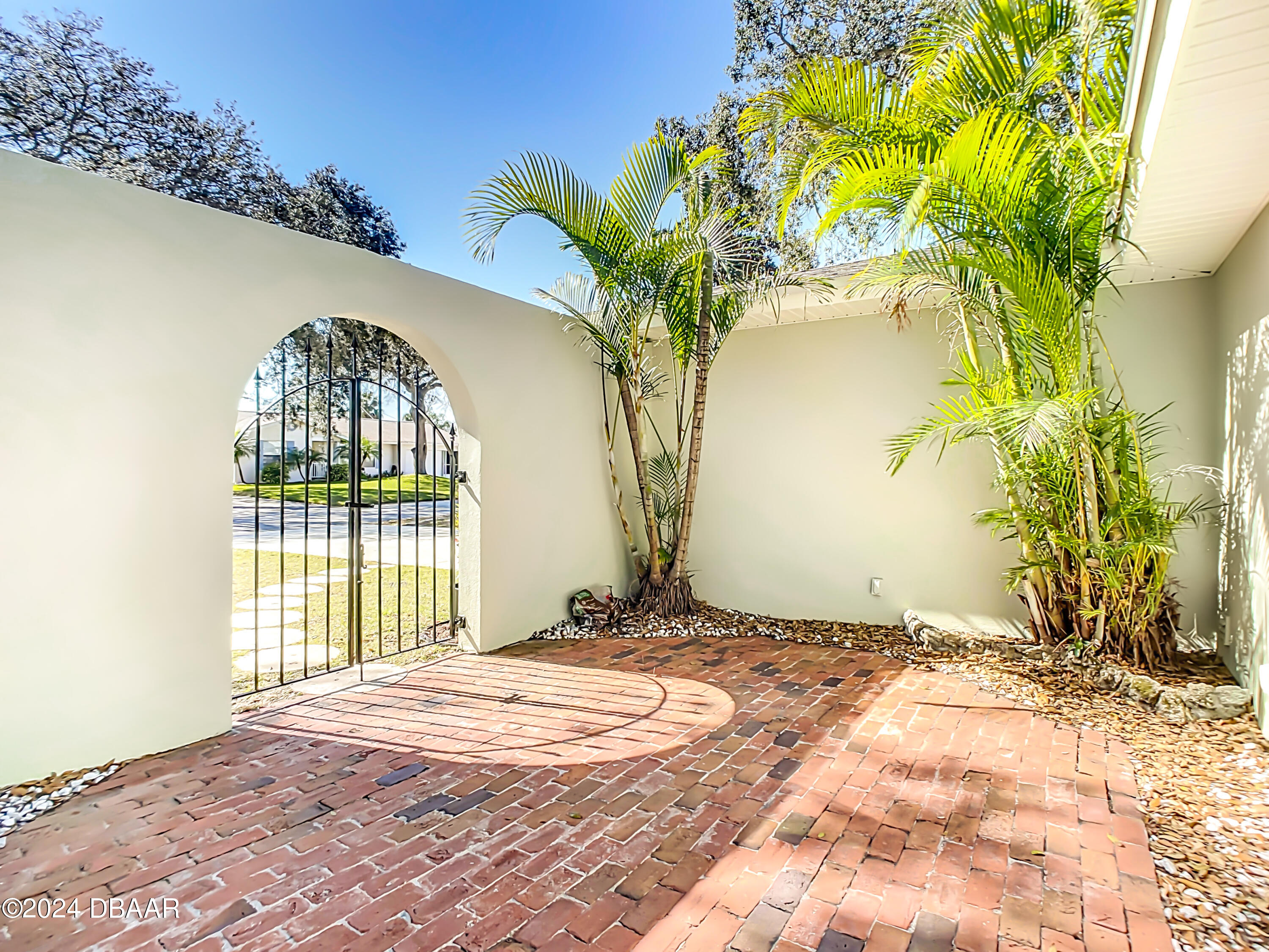 55 Merrywood Circle Ormond Beach, FL 32174 - Photo 3 of 64 a view of entryway front of a house