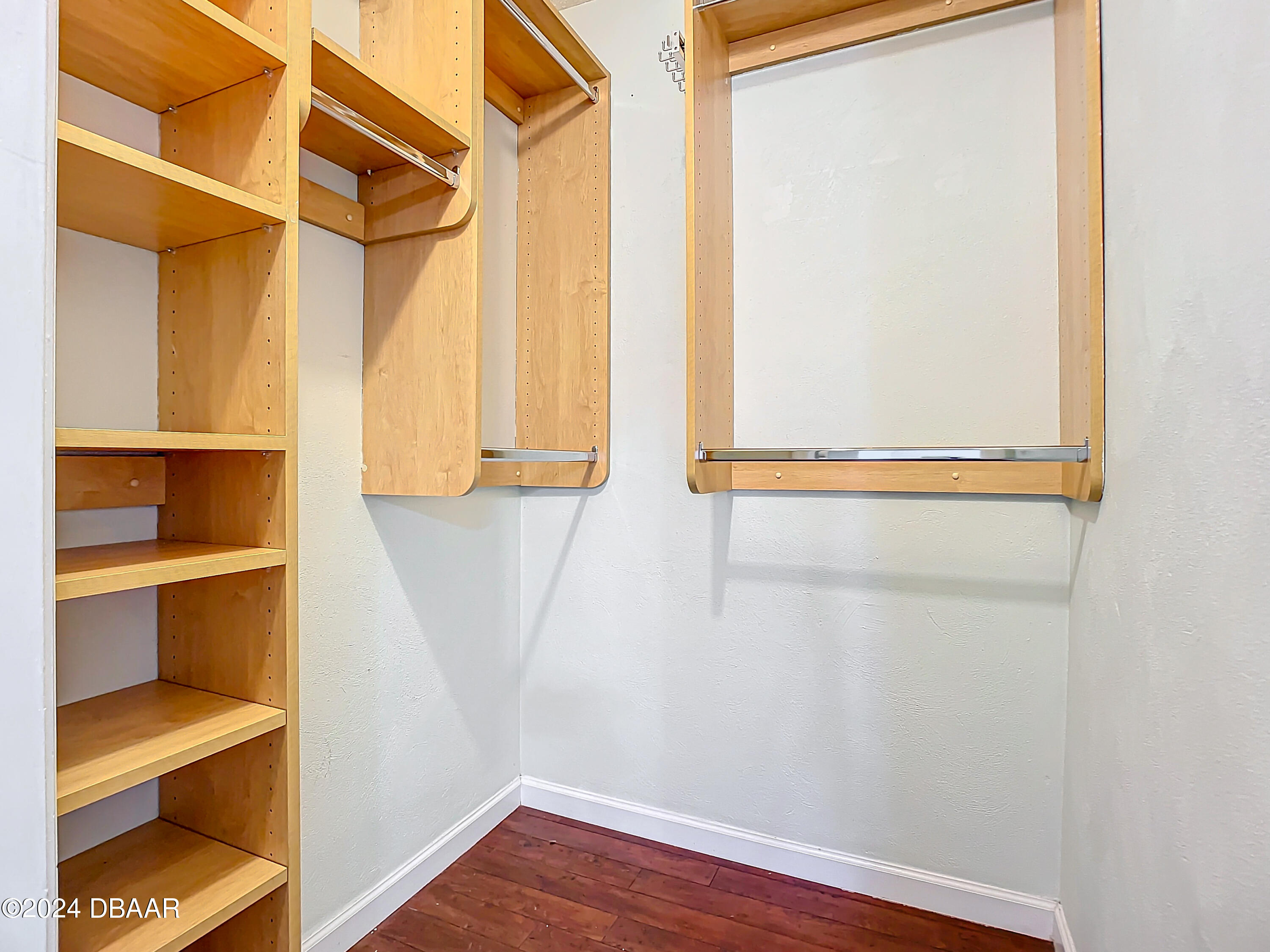 55 Merrywood Circle Ormond Beach, FL 32174 - Photo 40 of 64 a view of walk in closet with empty racks