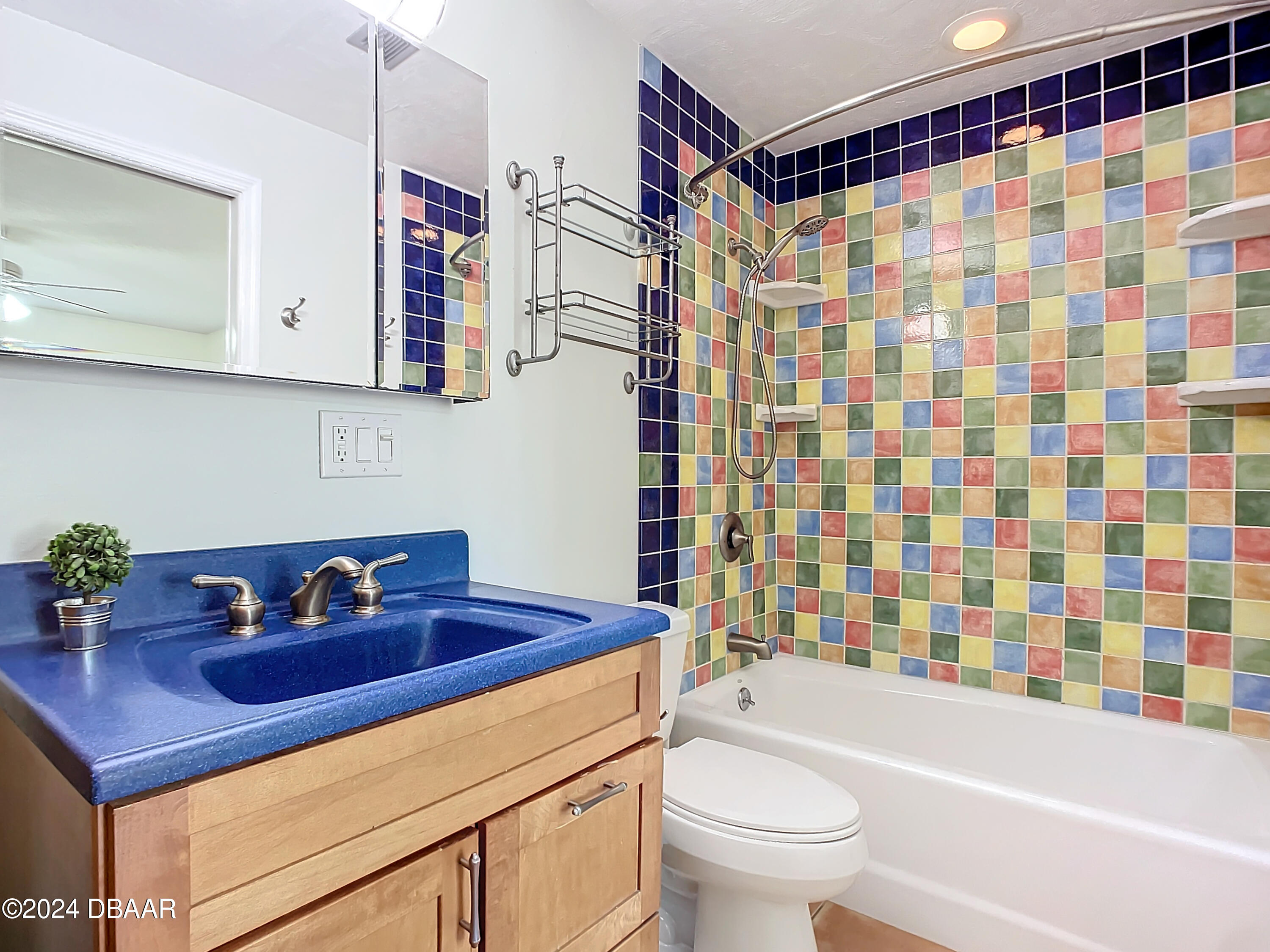 55 Merrywood Circle Ormond Beach, FL 32174 - Photo 42 of 64 a bathroom with a sink a toilet and a bathtub