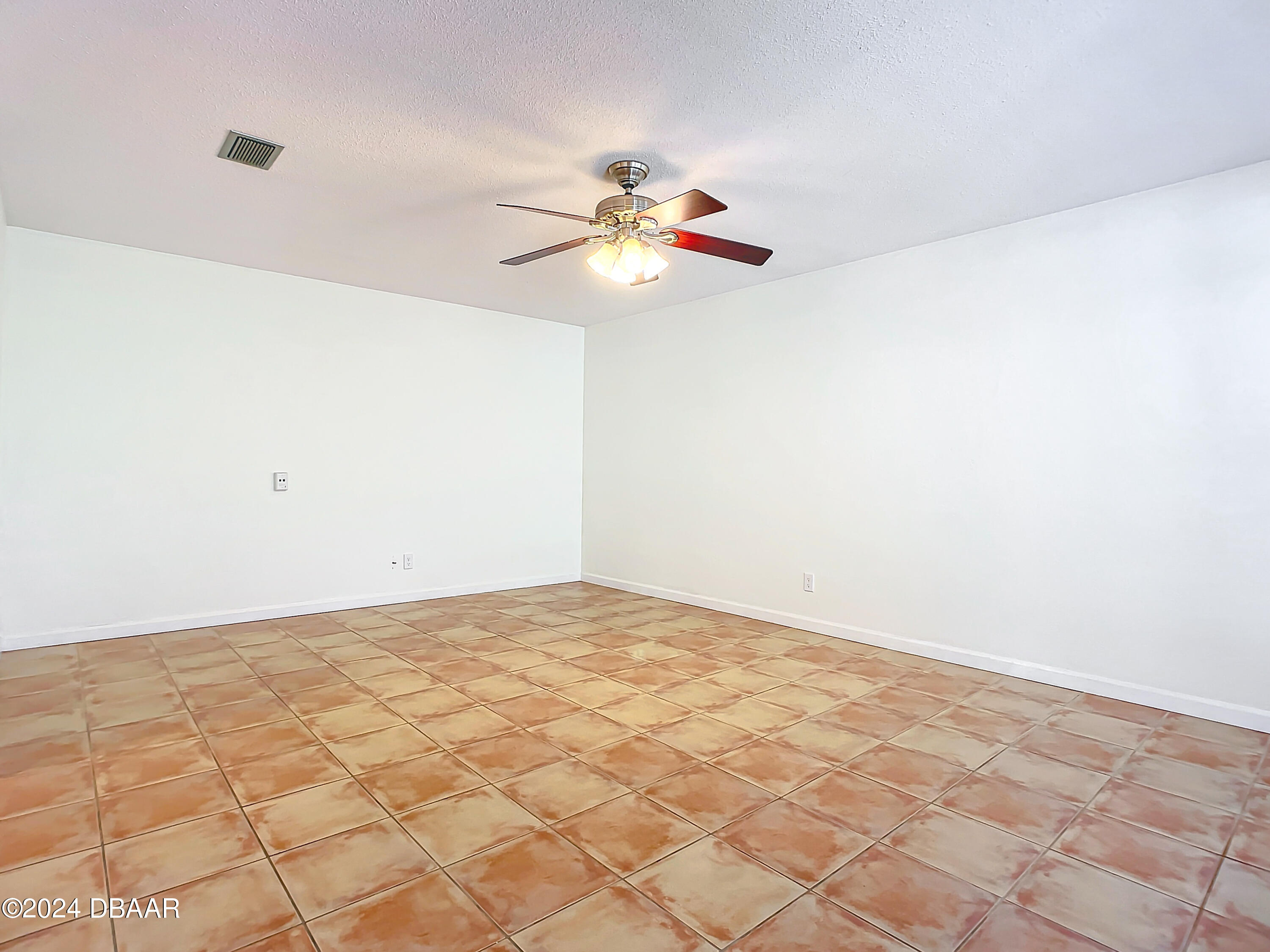 55 Merrywood Circle Ormond Beach, FL 32174 - Photo 7 of 64 a view of a big room with carpet