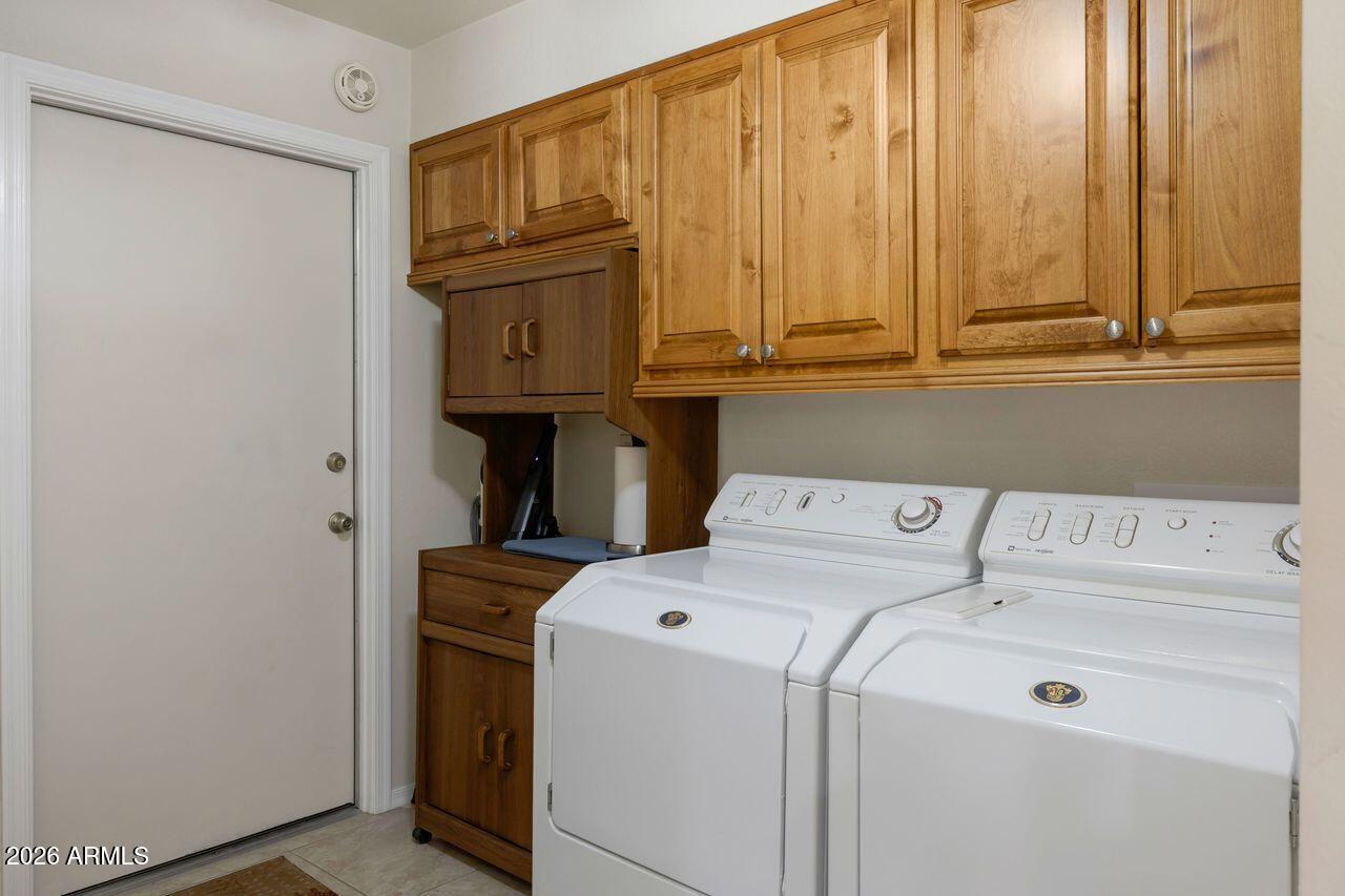 7618 West John Cabot Road Glendale, AZ 85308 - Photo 41 of 43 Laundry with storage