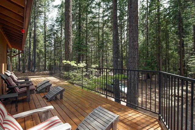 a view of balcony with wooden floor