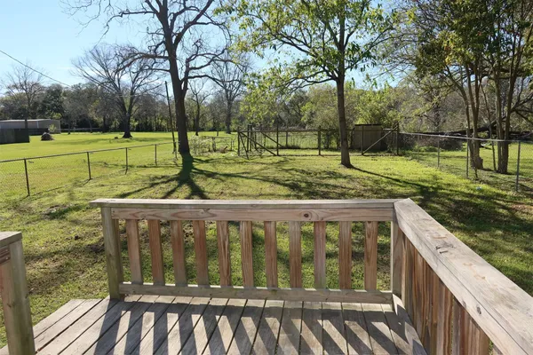 a view of a wooden fence
