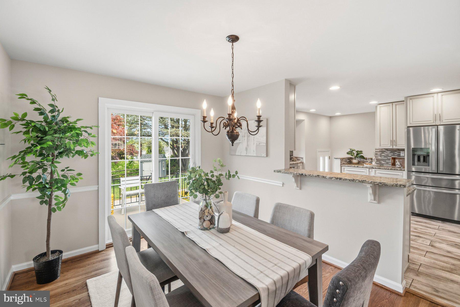 214 Chantrey Road Lutherville-Timonium, MD 21093 - Photo 18 of 54 Dining Room with Slider to Upper Deck