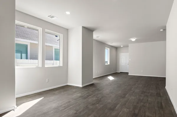 a kitchen with granite countertop appliances cabinets and a sink