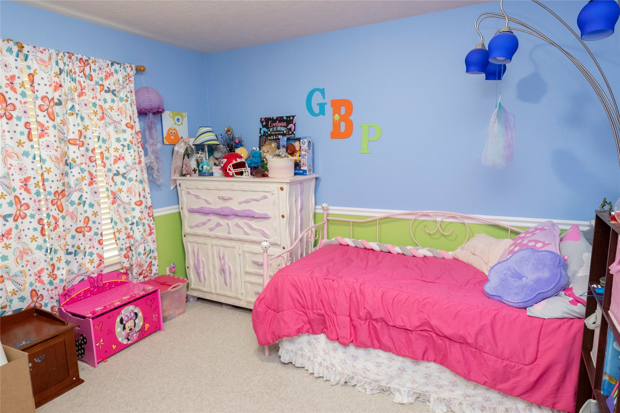 1608 Allison Street Brenham, TX 77833 - Photo 11 of 16 a bedroom with a bed and a couch