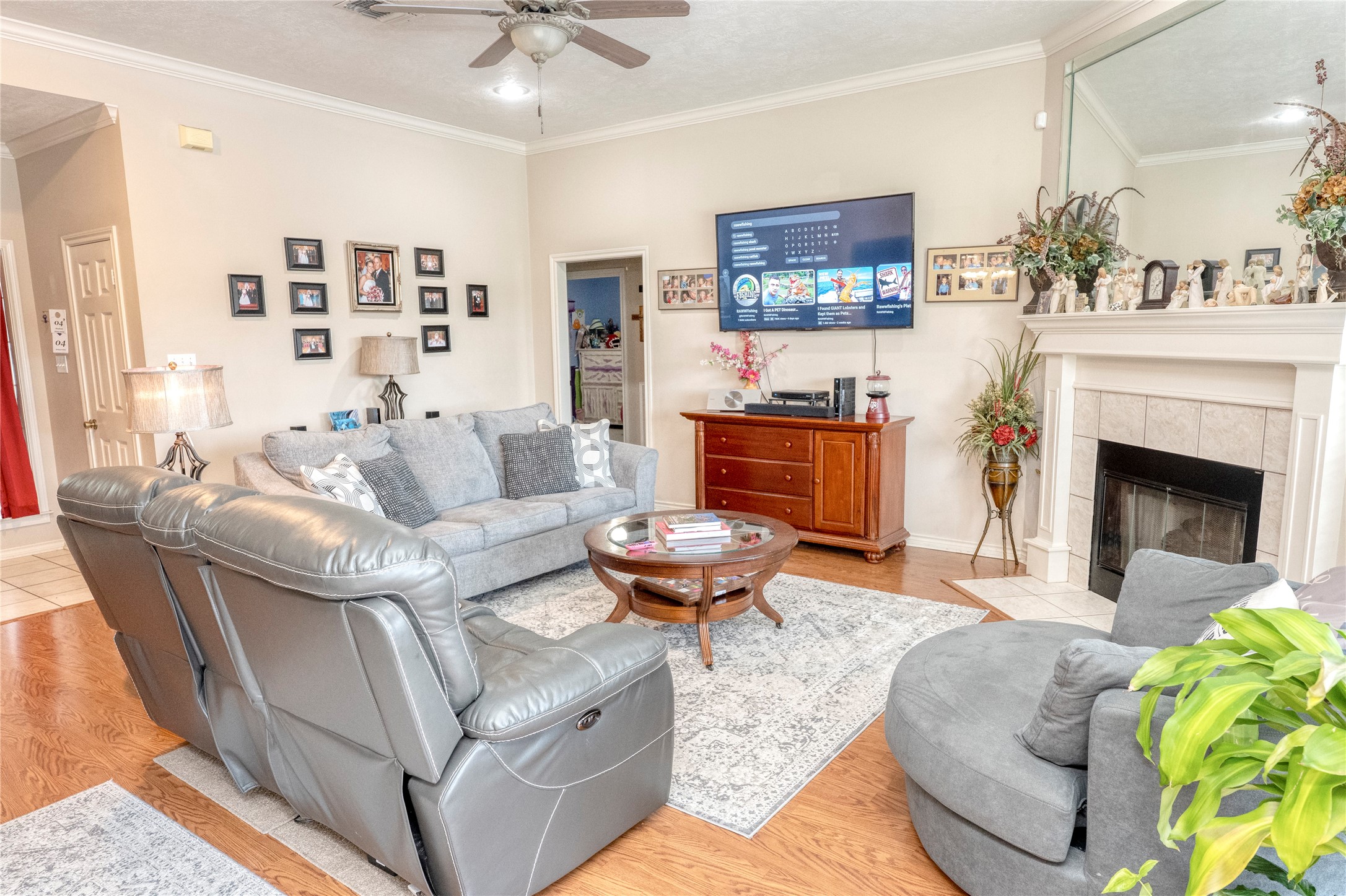 1608 Allison Street Brenham, TX 77833 - Photo 3 of 16 a living room with furniture and a fireplace