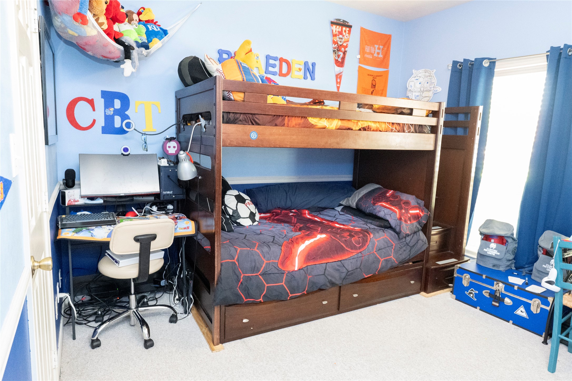 1608 Allison Street Brenham, TX 77833 - Photo 10 of 16 a bedroom with a bed and furniture