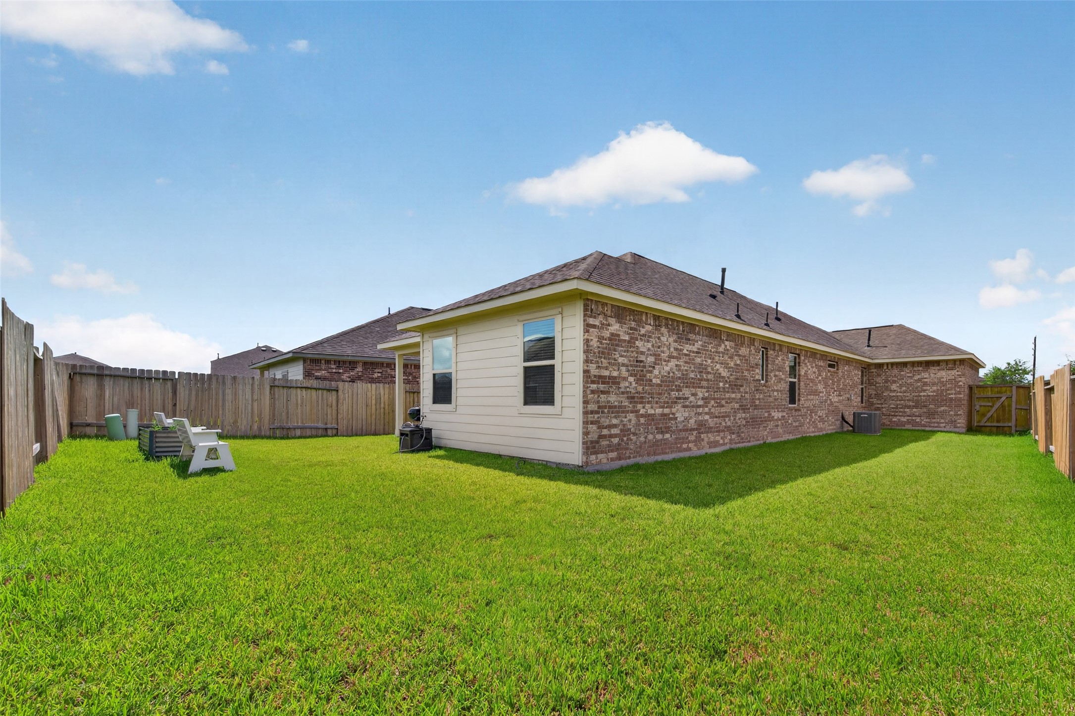 1329 Red Hills Drive Rosharon, TX 77583 - Photo 26 of 27 Backyard space surrounding by wooden fencing.
