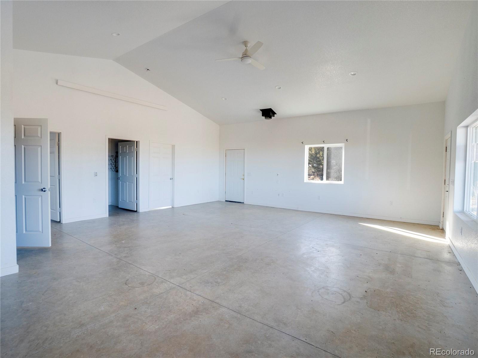491 Ketchum Road Walsenburg, CO 81089 - Photo 13 of 20 a view of an empty room with a window