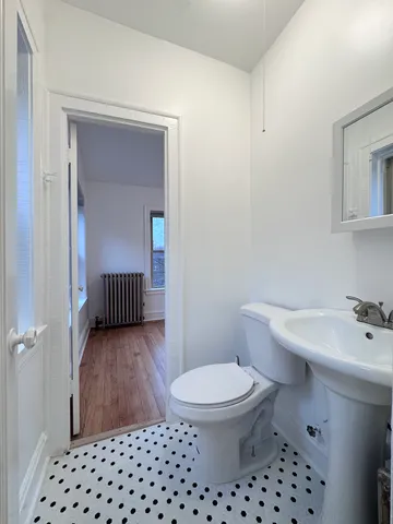 a bathroom with a sink and a toilet