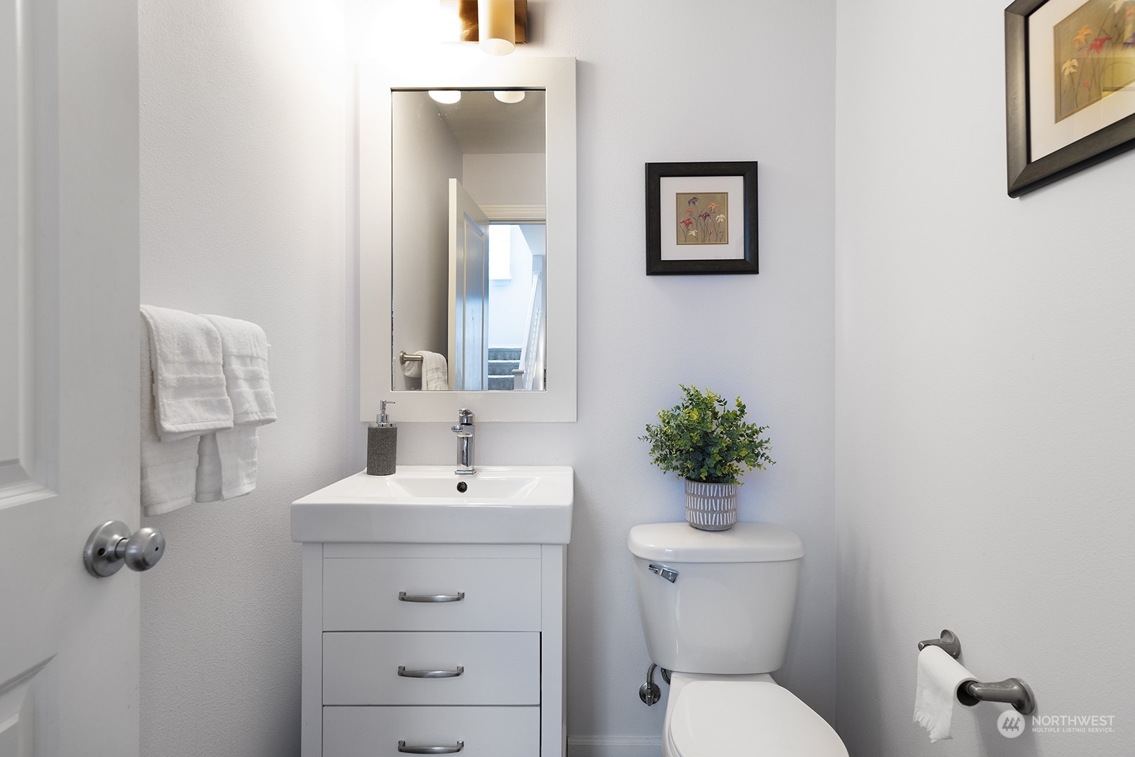 3602 195th Place Southeast Bothell, WA 98012 - Photo 12 of 28 a bathroom with a toilet sink and mirror